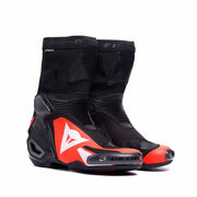 Dainese AXIAL 2 racing motorcycle boots in black and red fluor, designed for high-performance motorcycling.