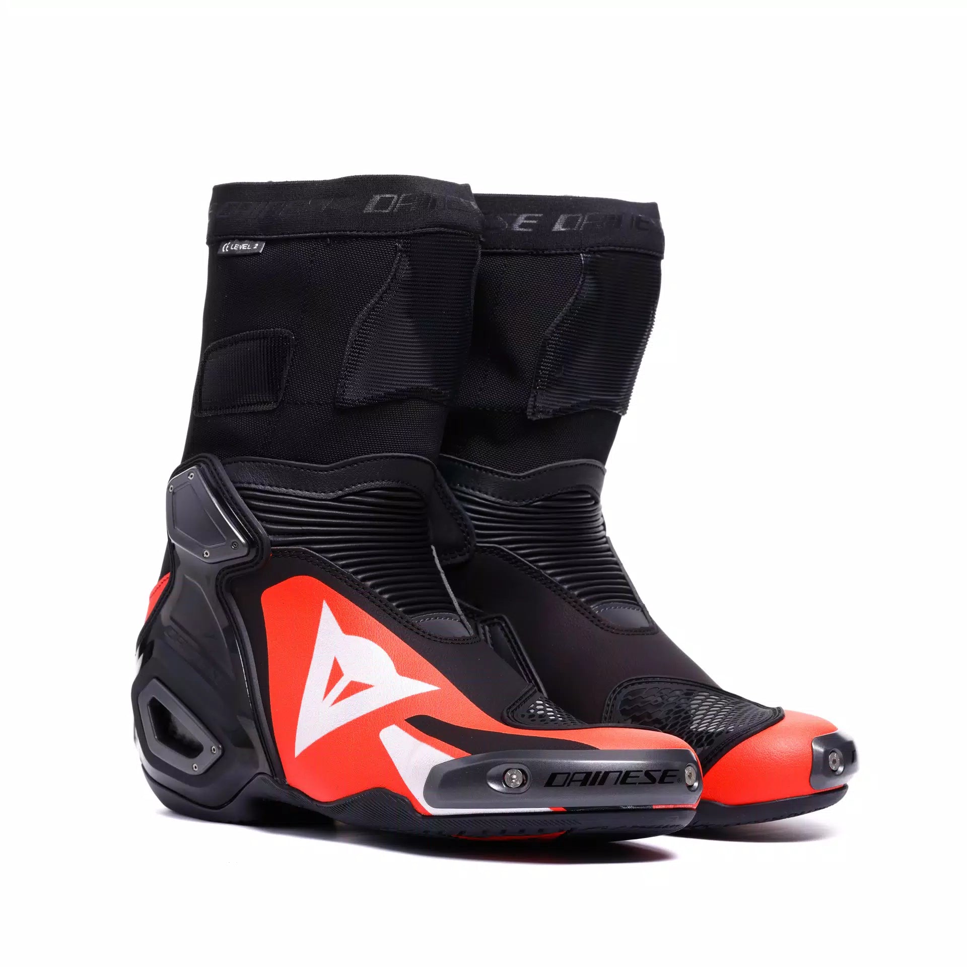 Dainese AXIAL 2 racing motorcycle boots in black and red fluor, designed for high-performance motorcycling.