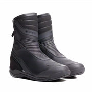 Dainese Blackwing waterproof Gore-Tex motorcycle boots with secure straps and reinforced soles, designed for riding comfort and protection.