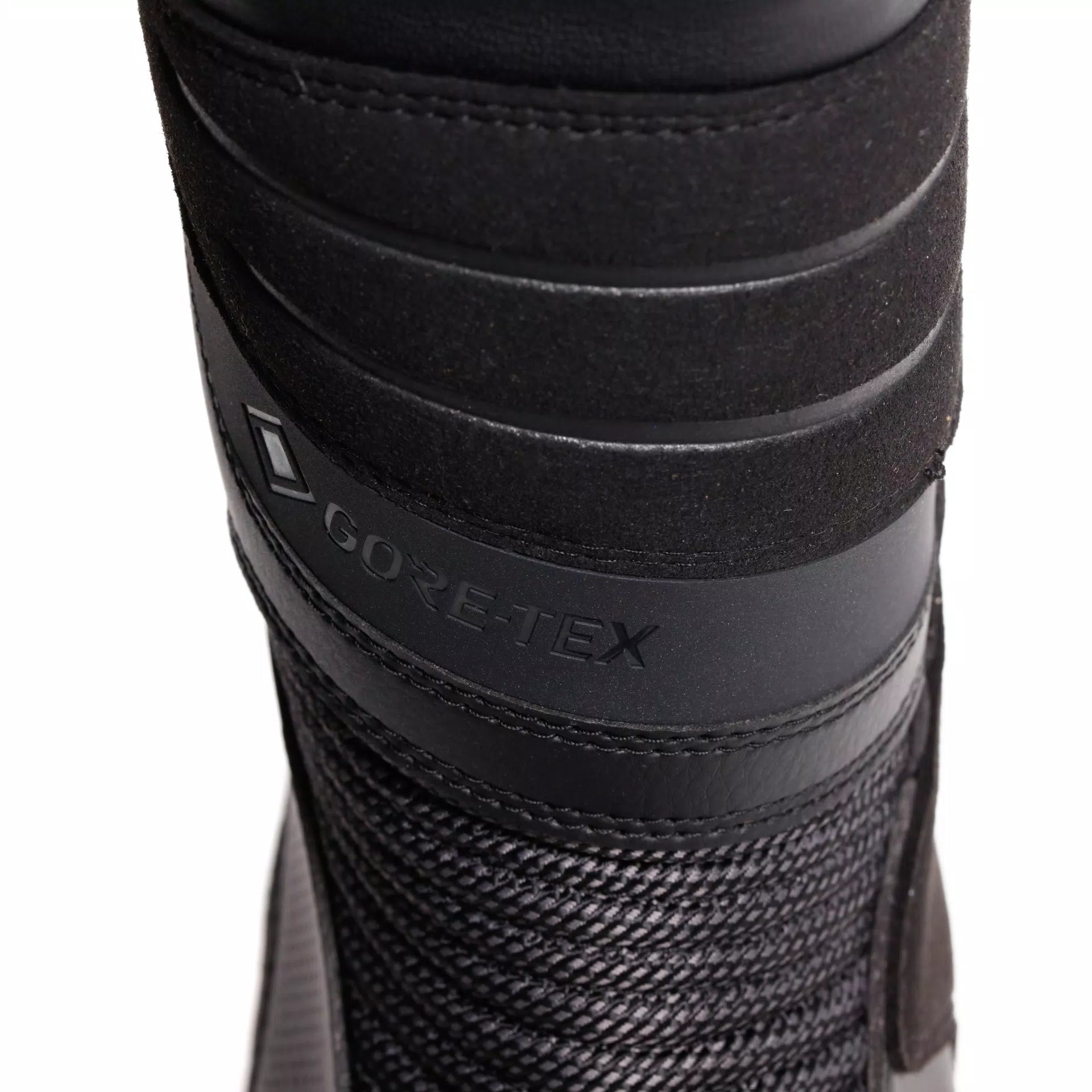 Black Dainese waterproof Gore-Tex motorcycle boots with sturdy design and protective features.