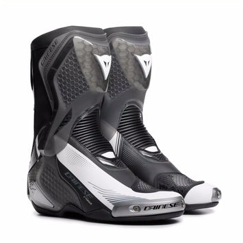 Dainese Torque 4 S black and white racing motorcycle boots with protective armor and sleek design.