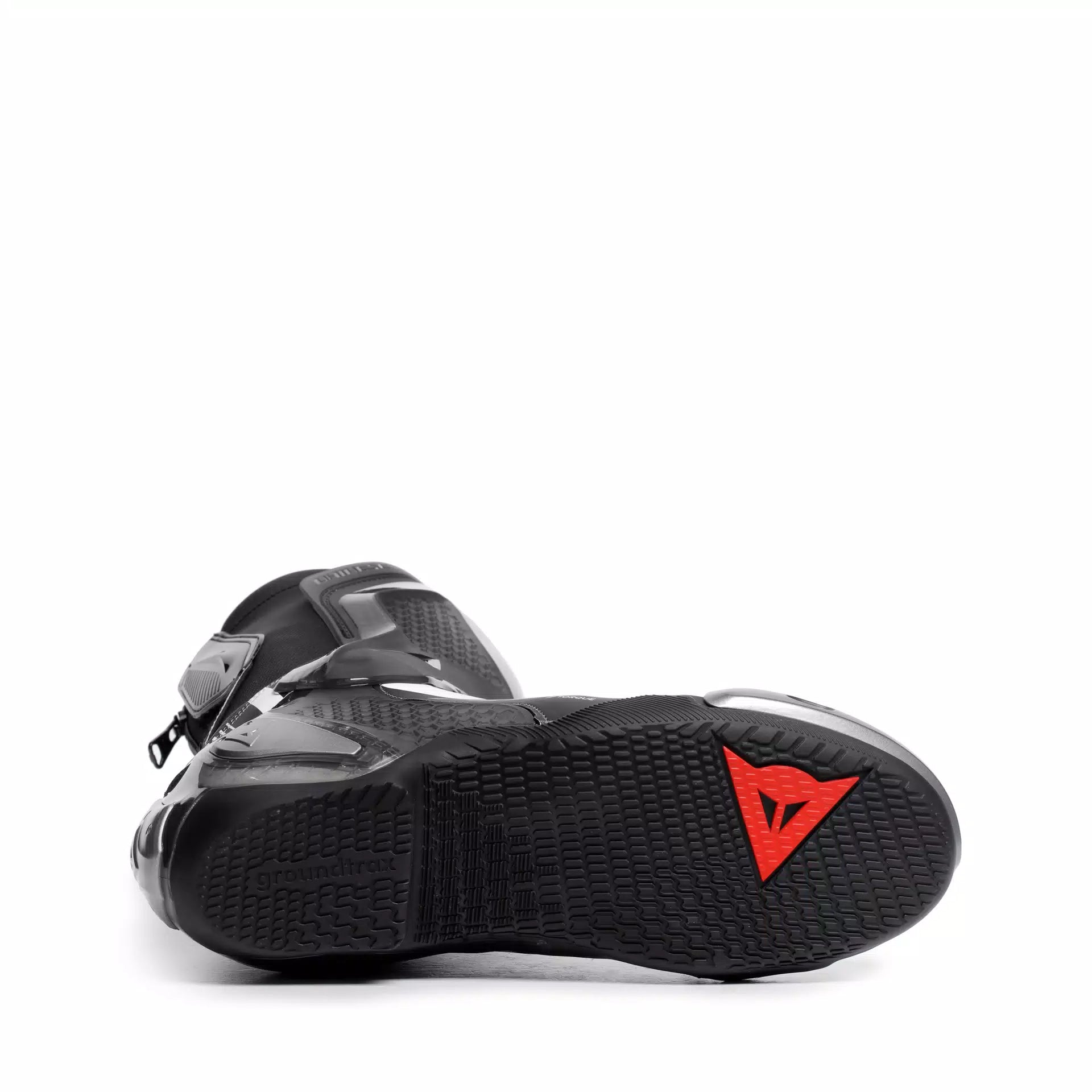 Dainese Torque 4 S black and white racing motorcycle boots with protective design and sturdy construction.