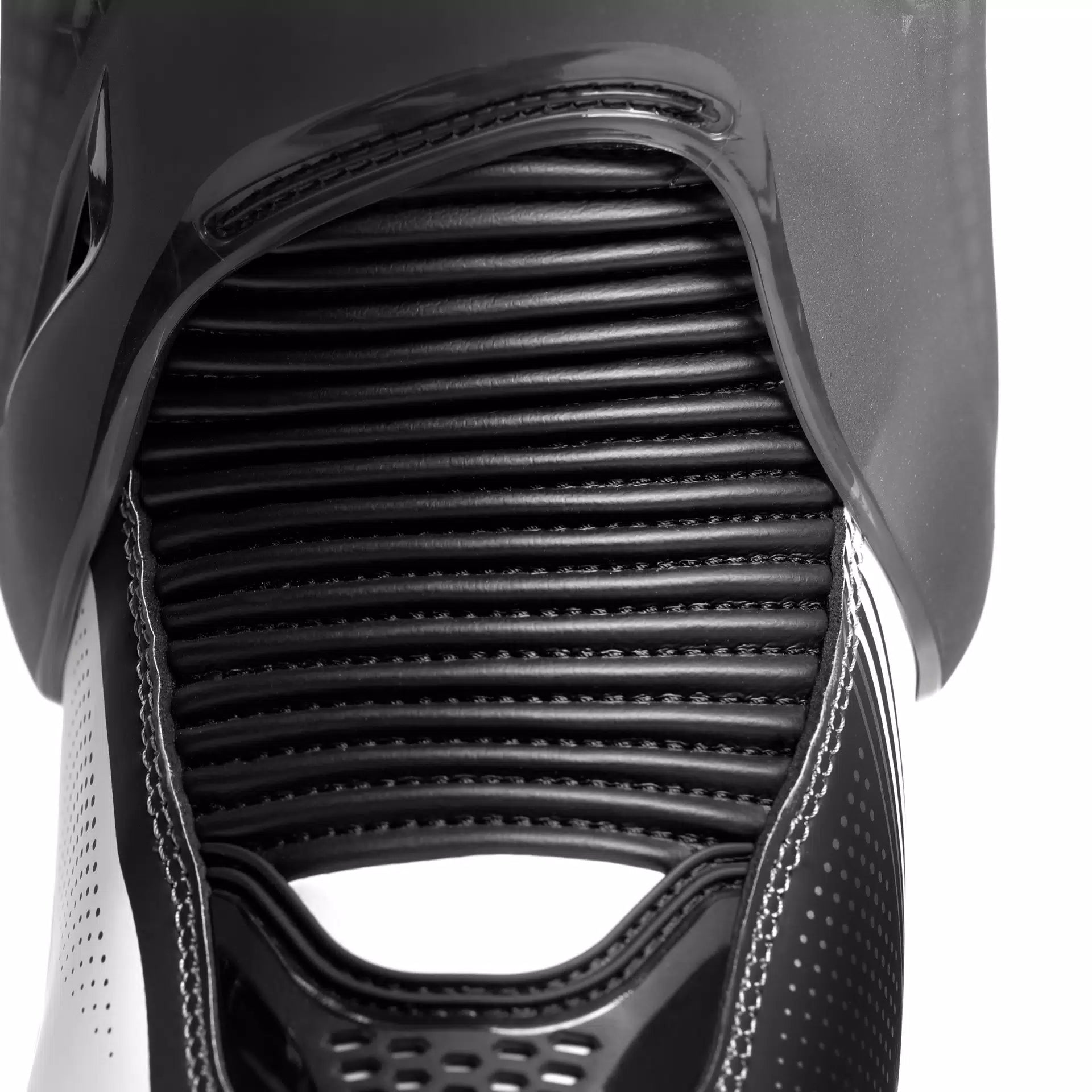 Dainese Torque 4 S black and white racing motorcycle boots with protective design and sturdy construction.