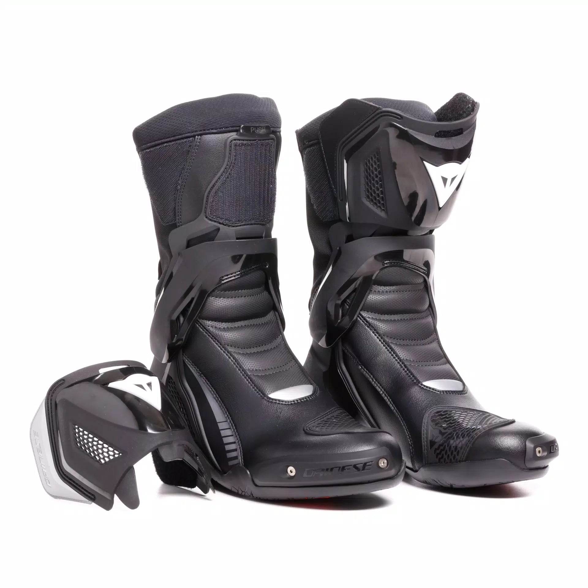 Dainese Nexus 3 black racing motorcycle boots with protective design and secure straps for enhanced riding safety.