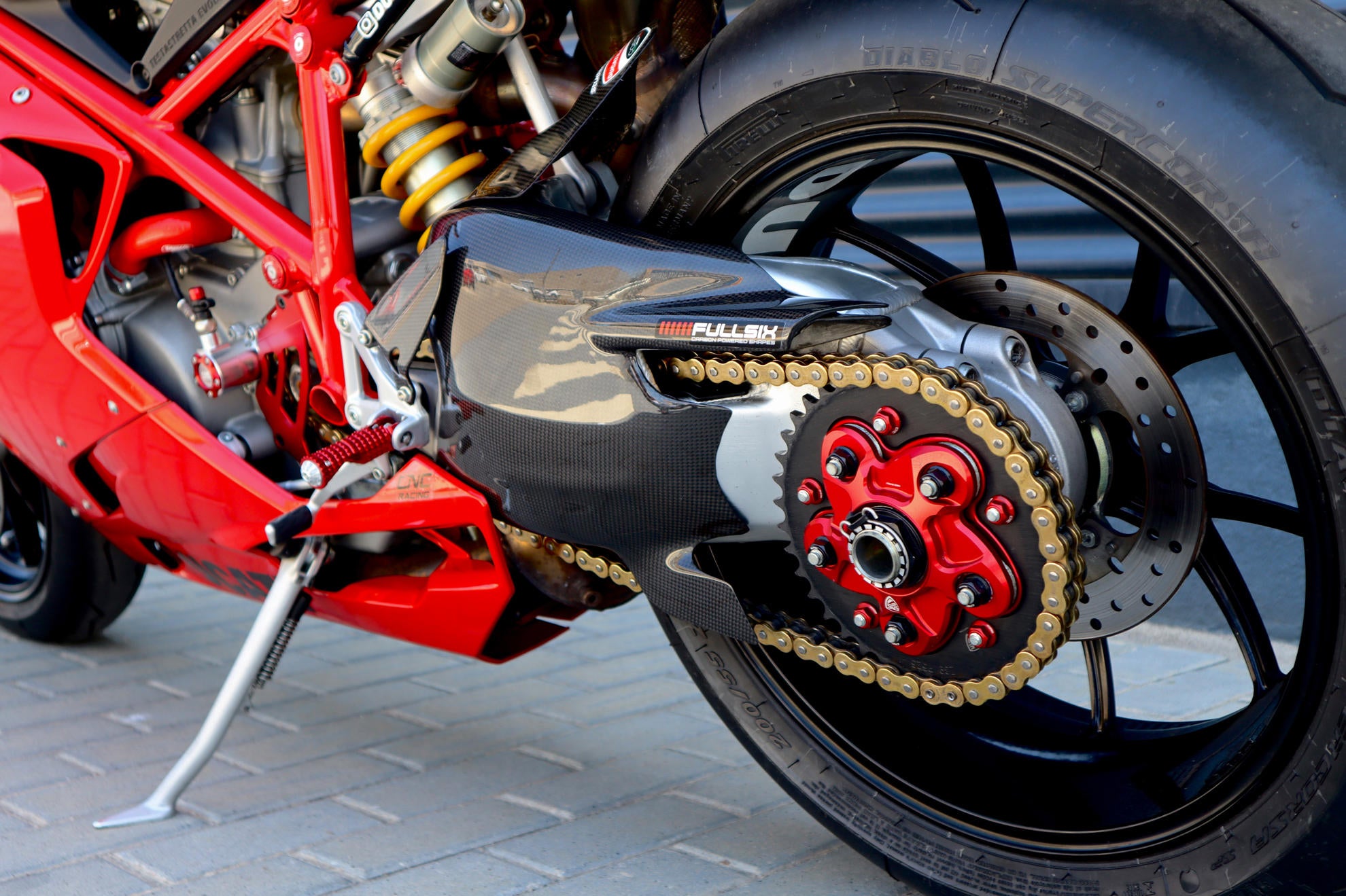 CORONA POSTERIORE COMPONIBILE Z40 P525 5 FORI CNC RACING DUCATI MONSTER 796