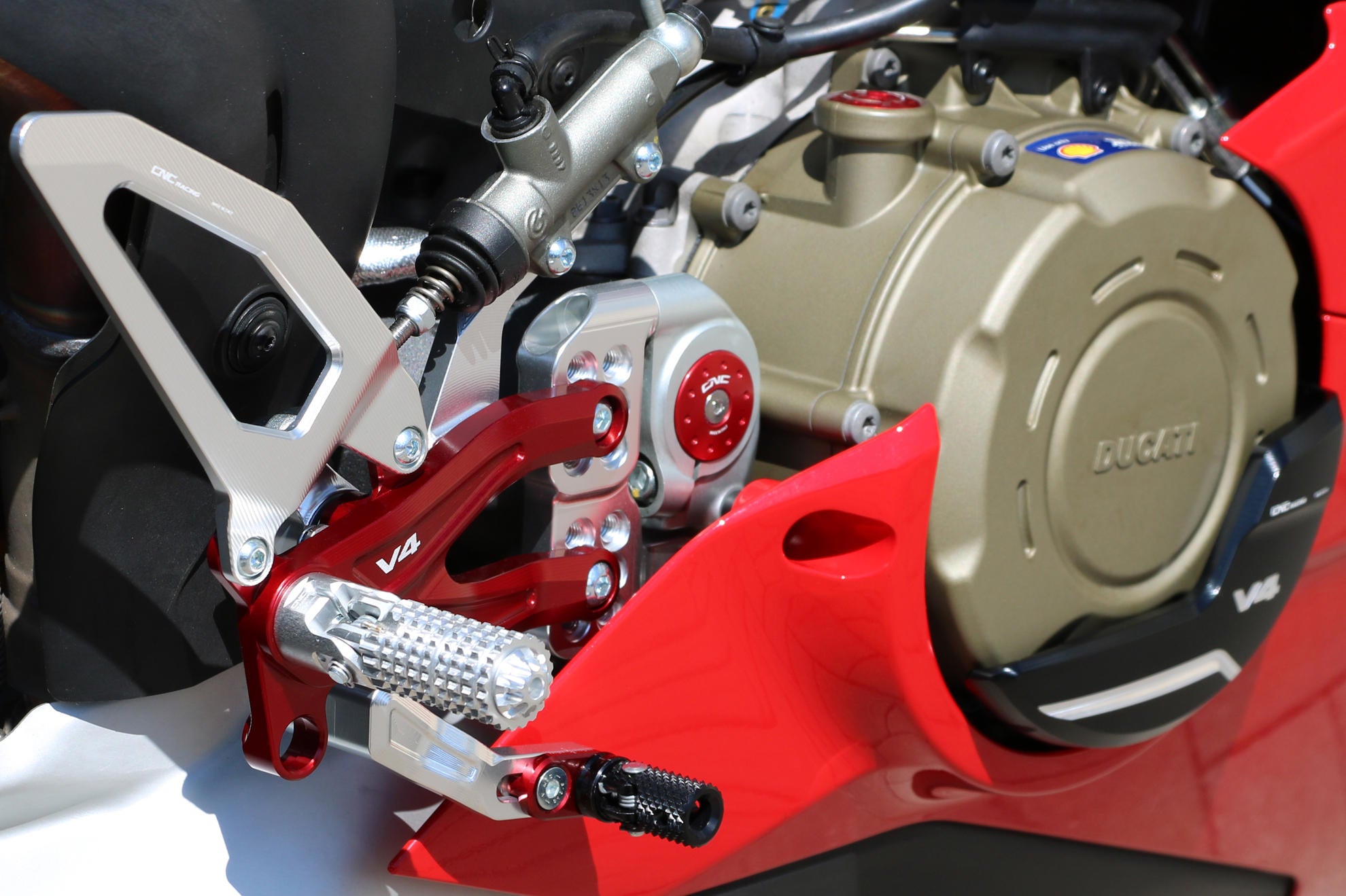 PEDANE PILOTA REGOLABILI PRAMAC CNC RACING DUCATI PANIGALE V4 / S / SPECIALE